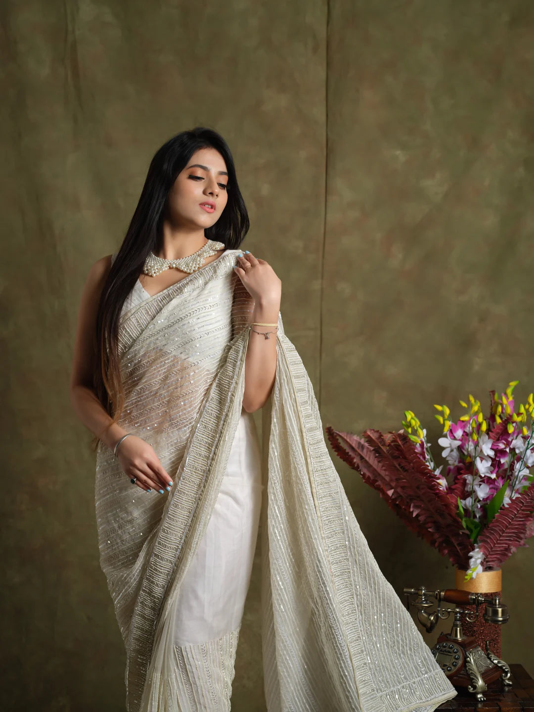 Whispering Pearls: Luxurious Handcrafted Saree