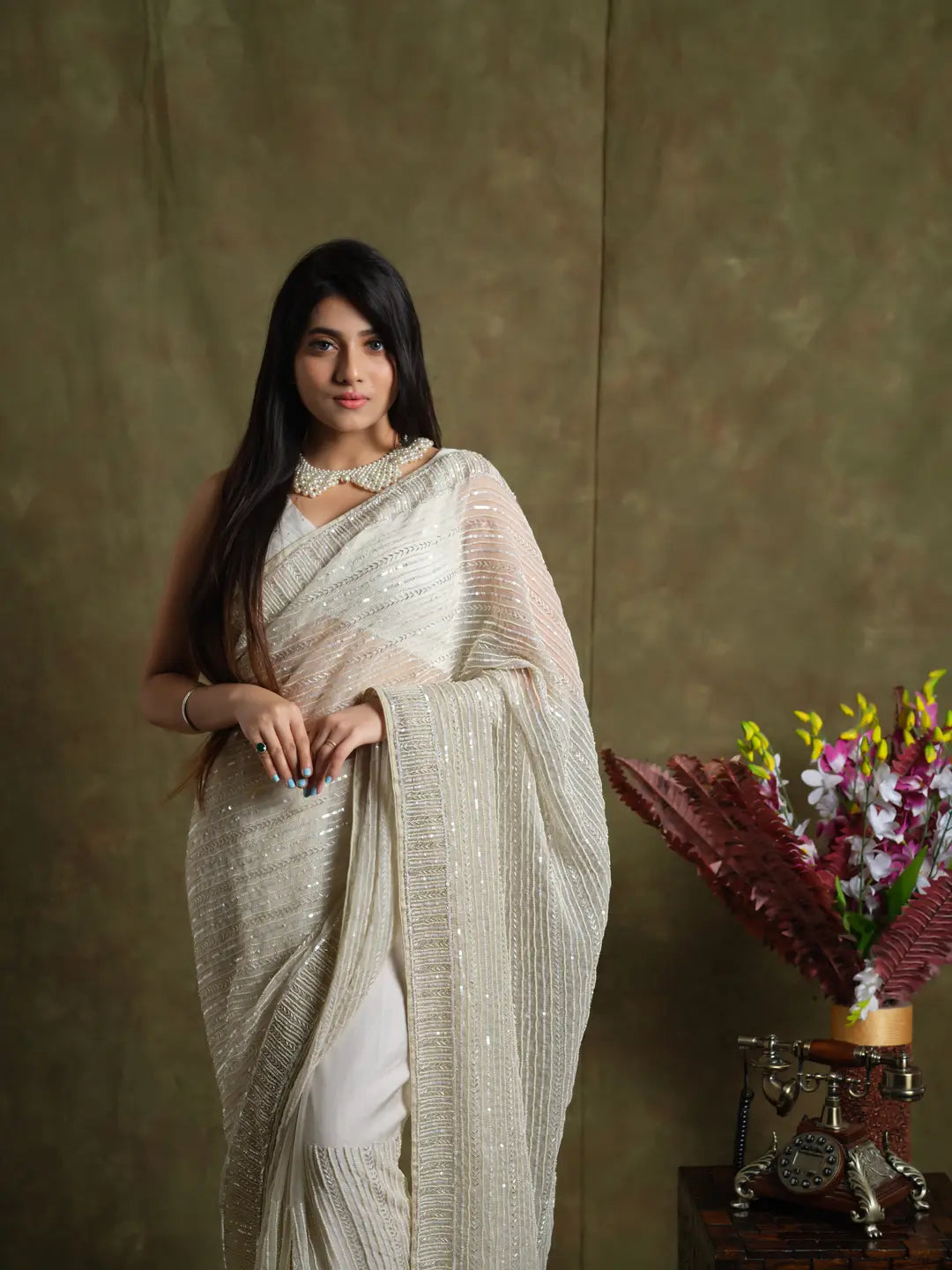 Whispering Pearls: Luxurious Handcrafted Saree