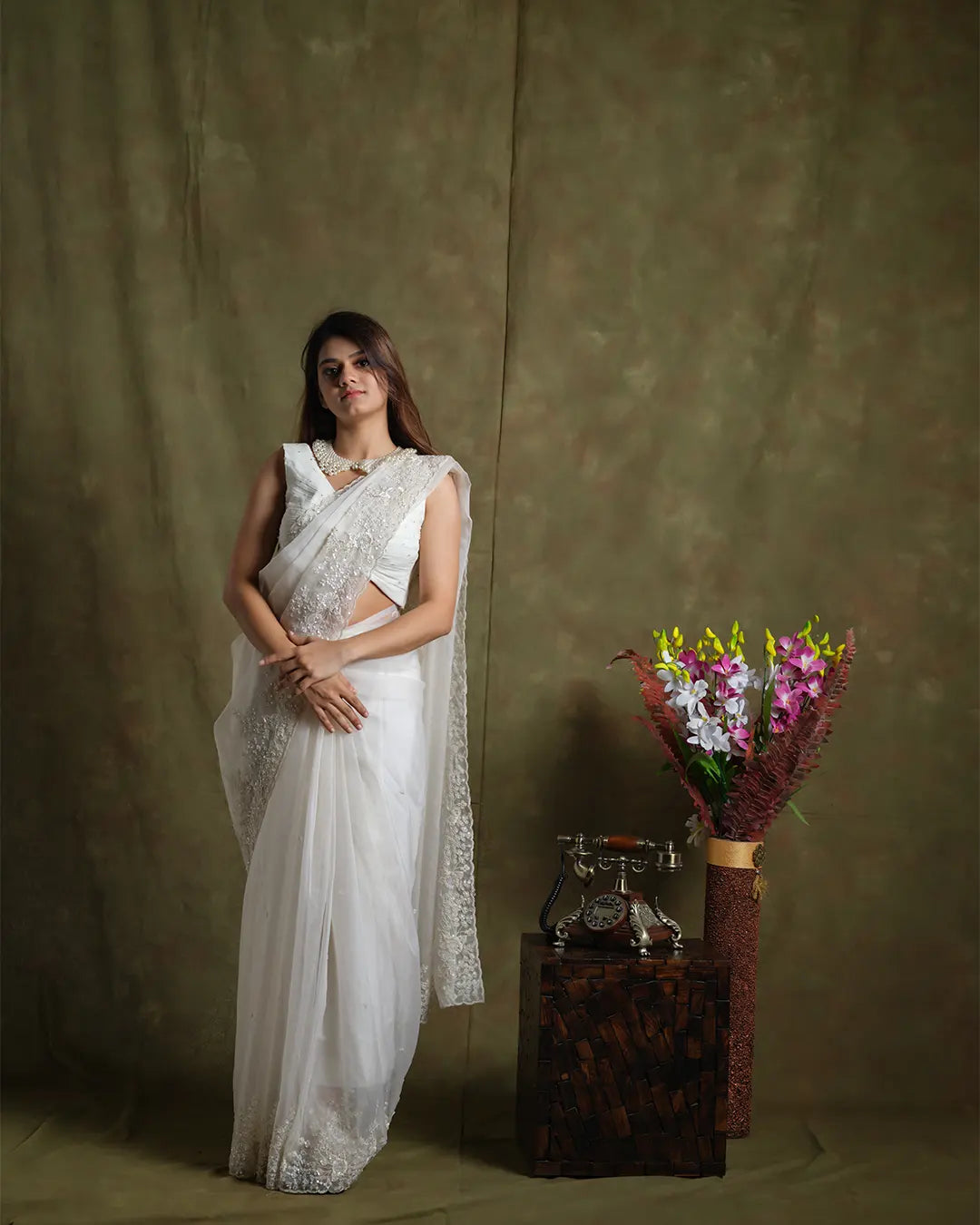 Whispering Petals: Floral Embroidered White Organza Saree