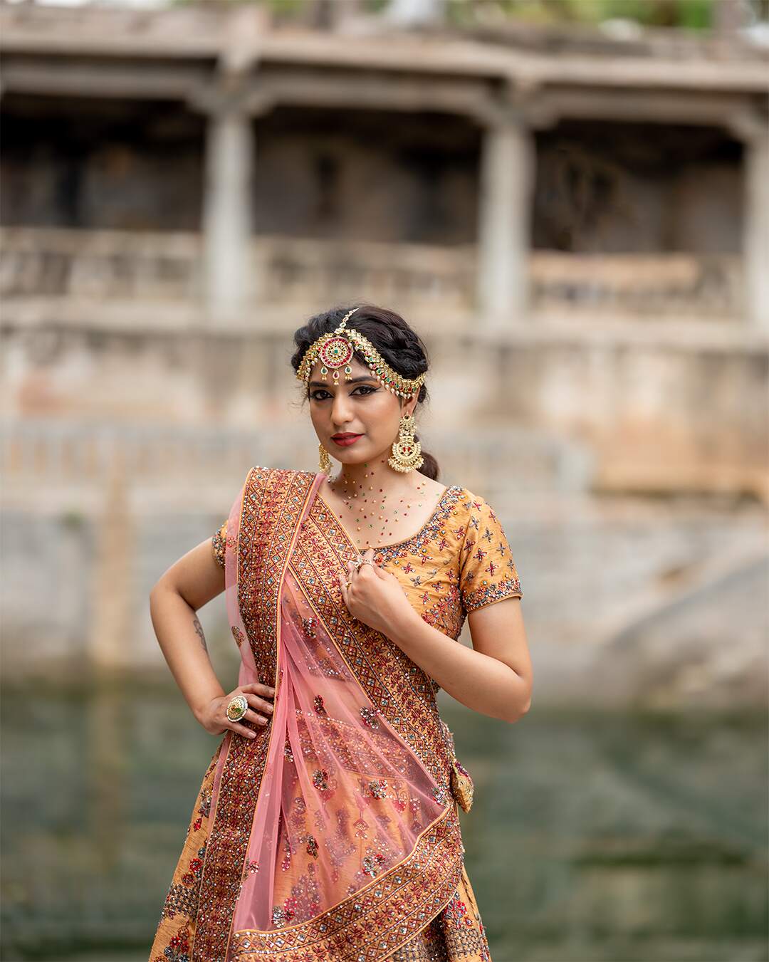 Almond Gold Bridal Lehenga Set With Multicolor Hand Embroidery