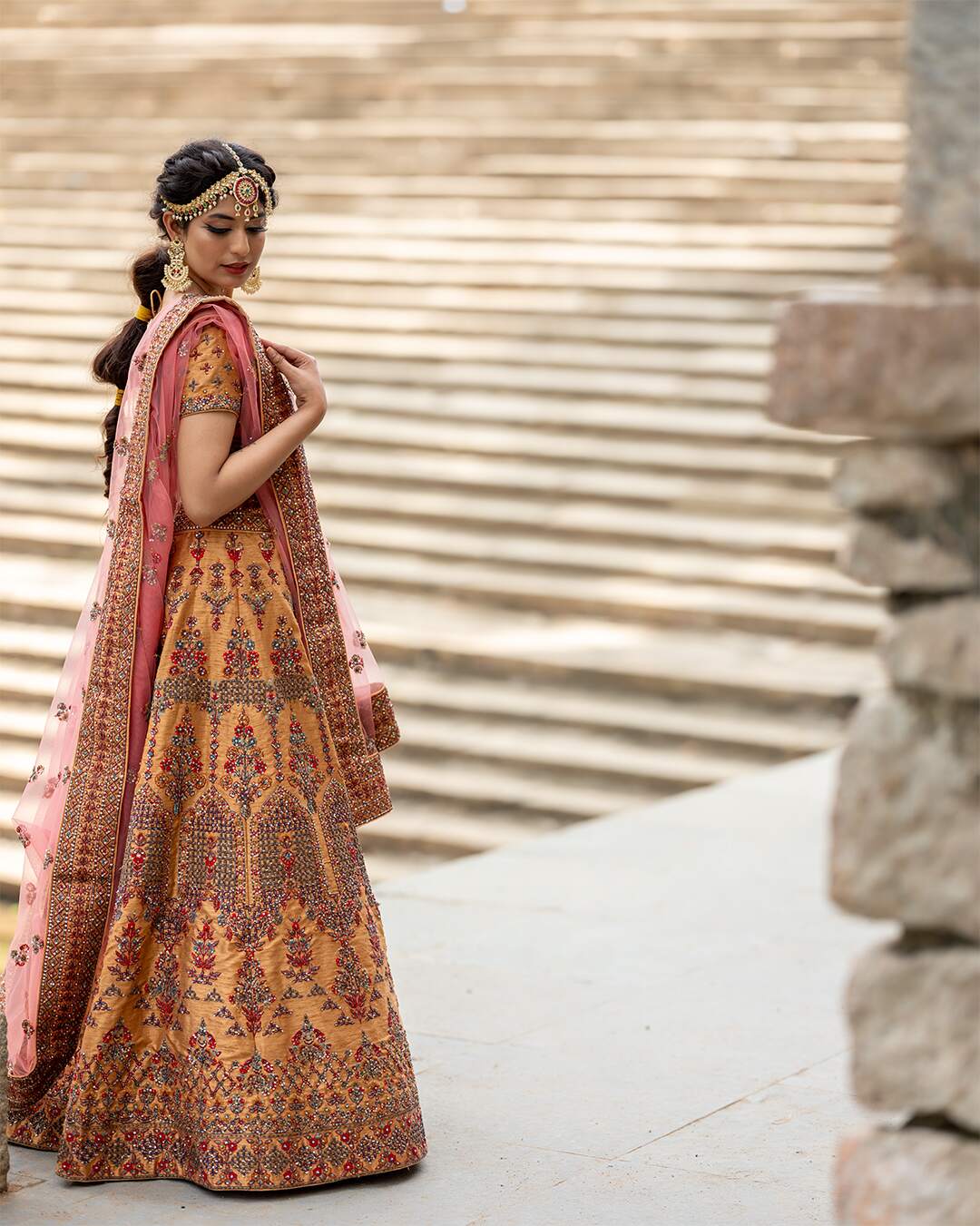 Almond Gold Bridal Lehenga Set With Multicolor Hand Embroidery