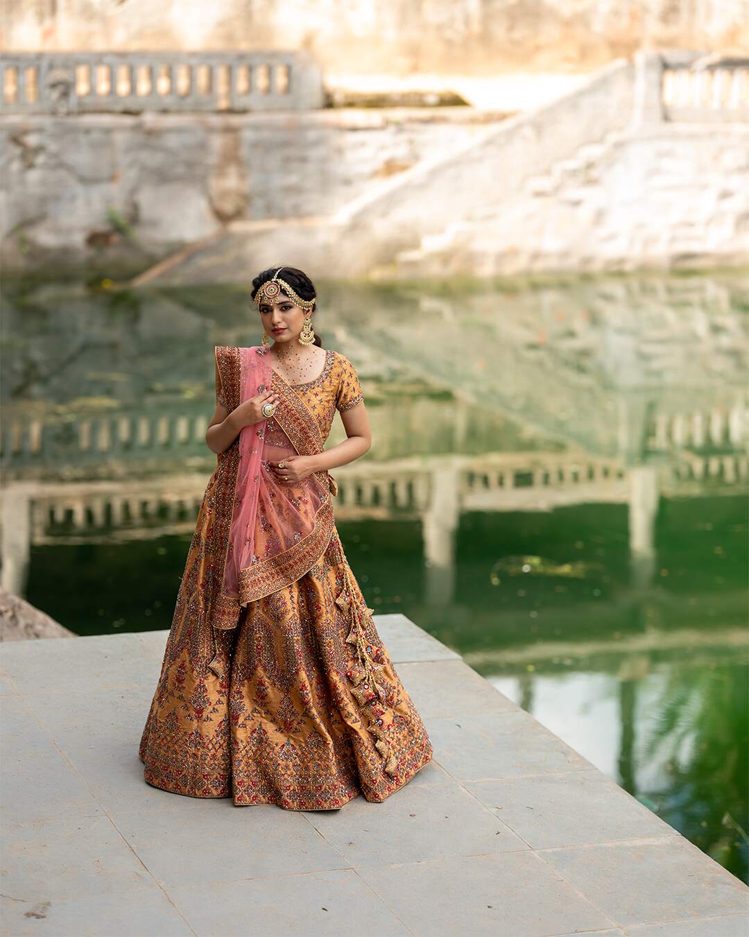 Almond Gold Bridal Lehenga Set With Multicolor Hand Embroidery