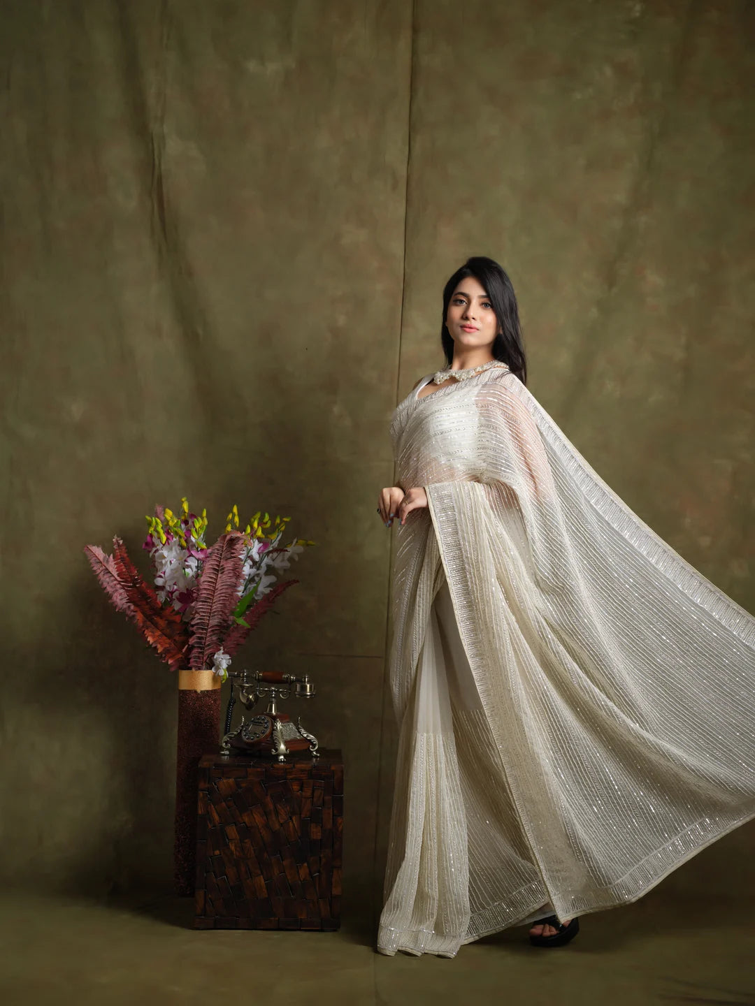 Whispering Pearls: Luxurious Handcrafted Saree