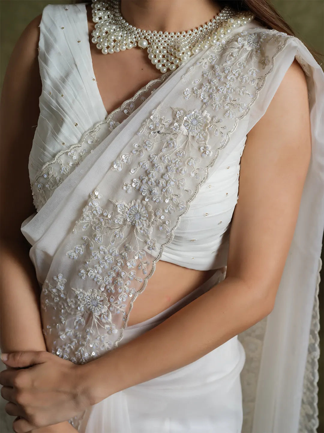 Whispering Petals: Floral Embroidered White Organza Saree