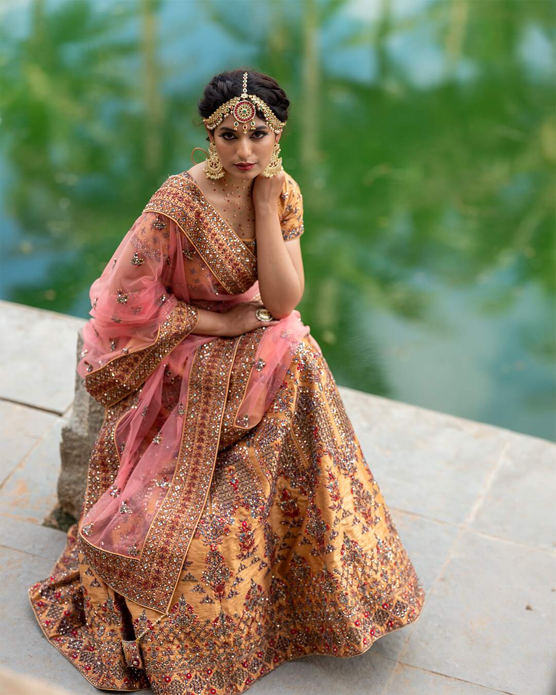 Almond Gold Bridal Lehenga Set With Multicolor Hand Embroidery